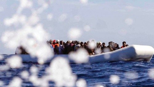 About 90 migrants wait for being rescued by members of the Spanish NGO Maydayterraneo in the ...