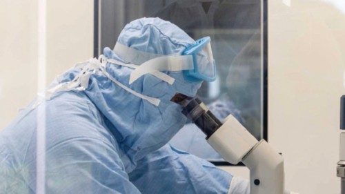 FILE PHOTO: A researcher works inside a laboratory during the development of the Italian ReiThera ...