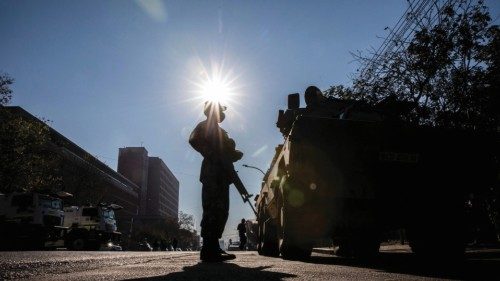 TOPSHOT - A South African National Defence Force (SANDF) soldier stands guard outside of the High ...