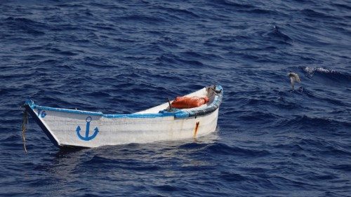 Birds fly off an abandoned wooden boat, seen from the German NGO migrant rescue ship Sea-Watch 3 in ...