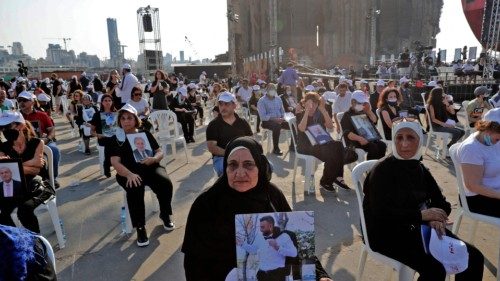 Relatives of the 2020 Beirut blast victims attend a Maronite Christian mass at the port of Lebanon's ... Relatives of the 2020 Beirut blast victims attend a Maronite Christian mass at the port of Lebanon's ...