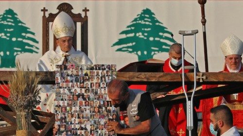 Maronite Christian Patriarch Bechara al-Raii (top L) heads mass at the port of Lebanon's capital ... Maronite Christian Patriarch Bechara al-Raii (top L) heads mass at the port of Lebanon's capital ...