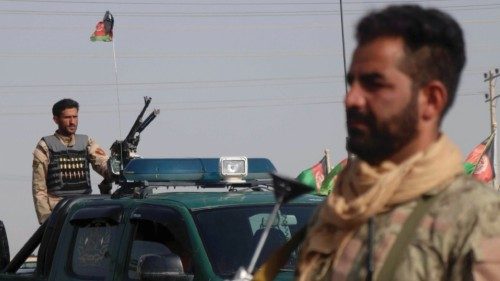 FILE PHOTO: Afghan security forces keep watch at a checkpoint in the Guzara district of Herat ...