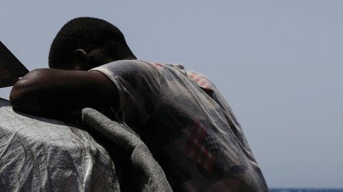 A migrant rests on the German NGO migrant rescue ship Sea-Watch 3 as the ship waits to be assigned a ...