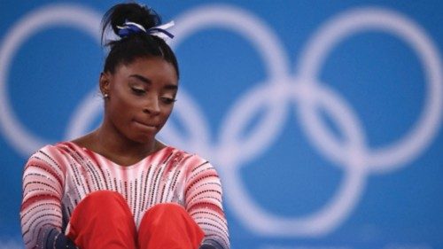 TOPSHOT - USA's Simone Biles waits ahead of the artistic gymnastics women's balance beam final of ...