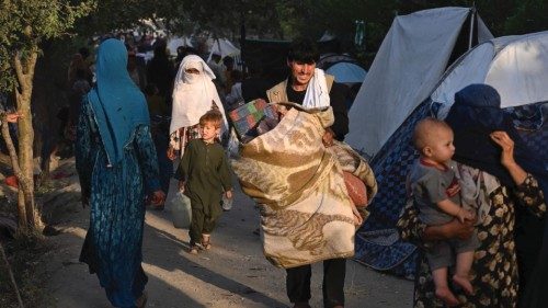 CORRECTION / TOPSHOT - Internally displaced Afghan families, who fled from Kunduz, Takhar and ...