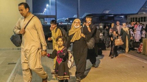 Evacuees from Afghanistan arrive at Al-Udeid airbase in Doha, Qatar in this recent undated handout. ... Evacuees from Afghanistan arrive at Al-Udeid airbase in Doha, Qatar in this recent undated handout. ...