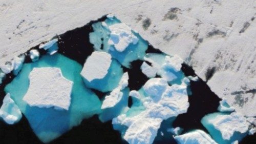 FILE PHOTO: An iceberg floats in a fjord near the town of Tasiilaq, Greenland, June 18, 2018. ... FILE PHOTO: An iceberg floats in a fjord near the town of Tasiilaq, Greenland, June 18, 2018. ...