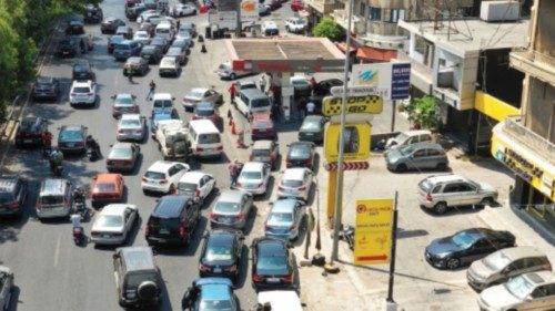 Cars queue to fuel up at a gas station in Dora, Lebanon August 20, 2021. Picture taken August 20, ...