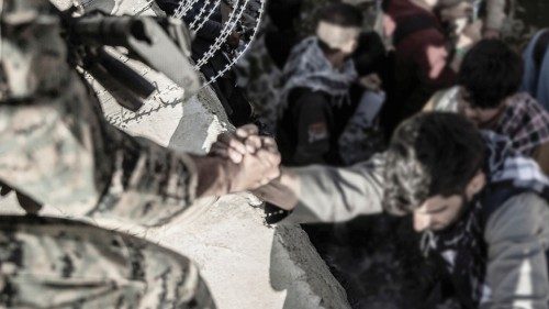 A U.S. Marine assists at an Evacuation Control Check Point (ECC) during an evacuation at Hamid ...