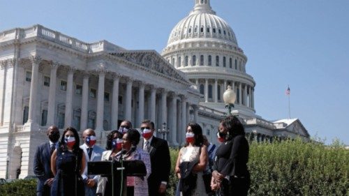 WASHINGTON, DC - AUGUST 24: Rep. Sheila Jackson-Lee (D-TX) (C) gives remarks at a press event with ...