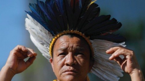 Guarani indigenous woman Maria Arapoty, 55, takes part in a protest against Brazil's president Jair ...