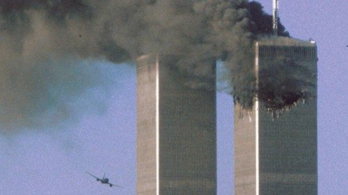 FILE PHOTO: Hijacked United Airlines Flight 175 flies toward the World Trade Center twin towers ...