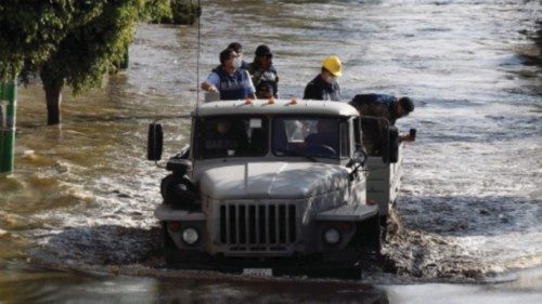 Members of the Mexican Navy patrol along flooded streets after heavy rains fell over Tula de ...