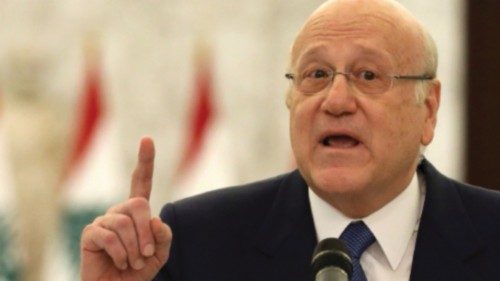 FILE PHOTO: Lebanon's Prime Minister Najib Mikati gestures as he speaks to the press at the ...