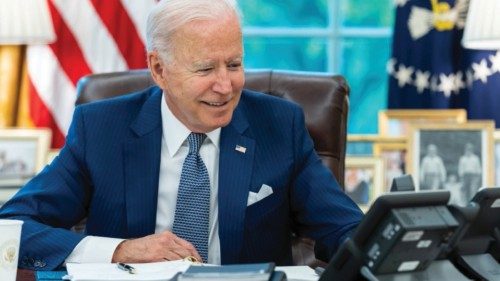 U.S. President Joe Biden speaks on the phone with French President Emmanuel Macron from the Oval ...