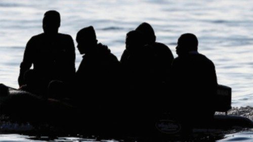 FILE PHOTO: People who say they are from Darfur, Sudan cross the English Channel in an inflatable ...