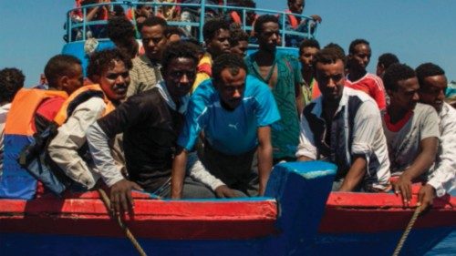 TOPSHOT - Migrants wait to be rescued by the Aquarius rescue ship run by non-governmental ...