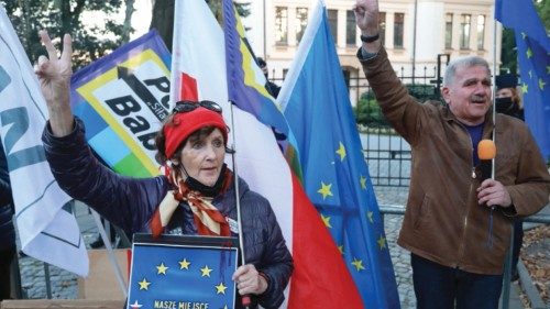 People demonstrate in front of the Constitutional Tribunal building, during a session ruling on ...