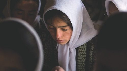 FILE PHOTO: Afghan girls attend a class at the Ishkashim high school for girls in the northeastern ...