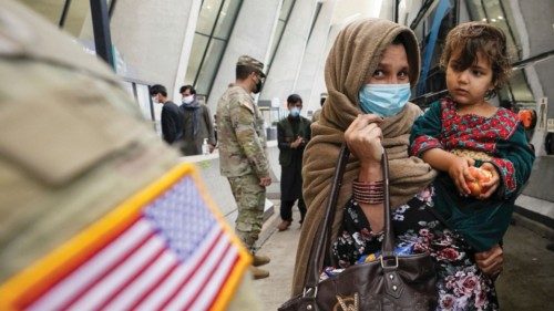 FILE PHOTO: A day after U.S. forces completed its troop withdrawal from Afghanistan, refugees board ...