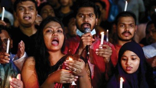 Students of the University of Dhaka join in a torch procession demanding justice for the violence ... Students of the University of Dhaka join in a torch procession demanding justice for the violence ...