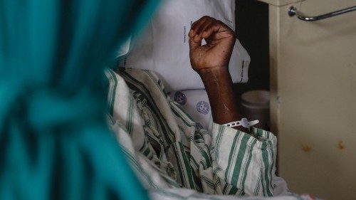 A patient infected with COVID-19 lies in bed at ward number 20 of the Tembisa Hospital in Tembisa, ... A patient infected with COVID-19 lies in bed at ward number 20 of the Tembisa Hospital in Tembisa, ...