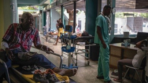 Maurice Jean, 77, waits to be helped at the Centre Hospitalier du Sacre-Coeur hospital after being ...