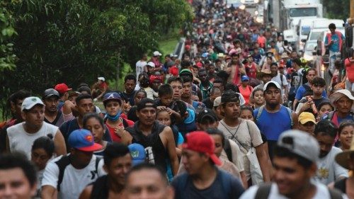 TOPSHOT - Migrants heading in a caravan to the US, walk towards Mexico City to request asylum and ...