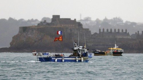 (FILES) In this file photo taken on May 06, 2021 French fishing boats protest in front of the port ...