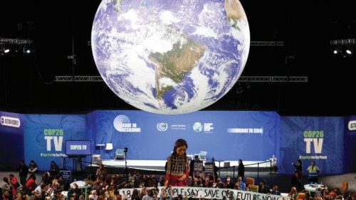 FILE PHOTO: People gather around FILE PHOTO: People gather around "Little Amal", a 3.5 metre tall puppet of a young Syrian refugee ...