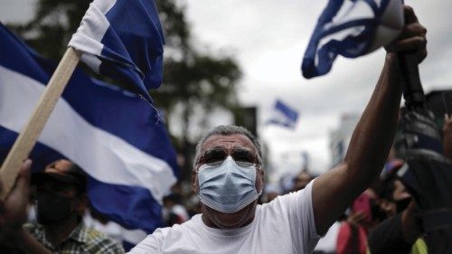 epa09570796 Exiled Nicaraguans protest through the main streets of San Jose against the presidential ...