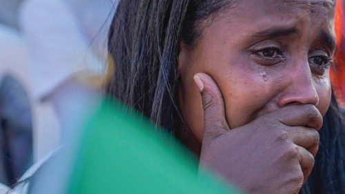 epa09561646 An Ethiopian woman weeps during an event marking the one year anniversary of the war in ...