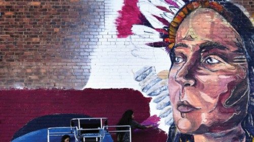Shilo Shiv Suleman of India, an artist with the Fearless Collective, paints a mural depicting ... Shilo Shiv Suleman of India, an artist with the Fearless Collective, paints a mural depicting ...