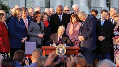U.S. President Joe Biden signs the "Infrastructure Investment and Jobs Act", on the South Lawn at ...