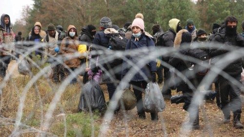 Migrants gather on the Belarusian-Polish border in an attempt to cross it at the Bruzgi-Kuznica ...