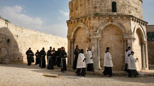 Franciscan friars and sisters pray during a mass for the Feast of the Ascension on The Rock of the ...