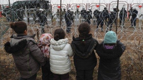Migrants aiming to cross into Poland camp near the Bruzgi-Kuznica border crossing on the ... Migrants aiming to cross into Poland camp near the Bruzgi-Kuznica border crossing on the ...