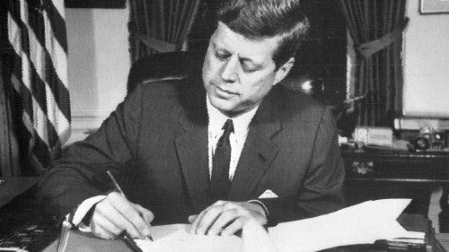 US President John Fitzgerald Kennedy signs the order of naval blockade of Cuba, on October 24, 1962 ...
