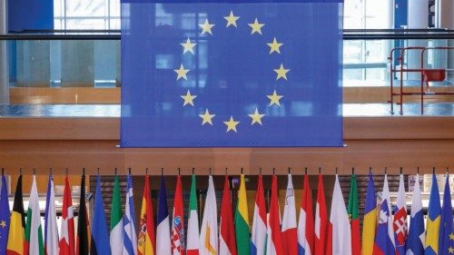 A picture taken on November 24, 2021 shows national flags of European Union's member countries at ...