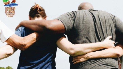 Group of people hugging in the park