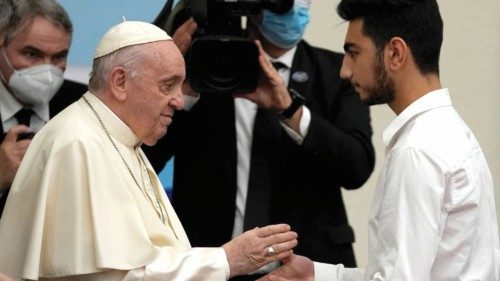 Student Aboud Gabro, 18, with his brother Mario, refugees from Syria, get gifts from Pope Francis ... Student Aboud Gabro, 18, with his brother Mario, refugees from Syria, get gifts from Pope Francis ...