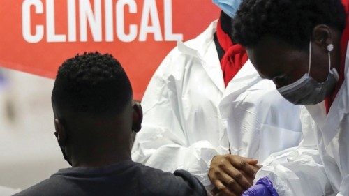 FILE PHOTO: A health worker administers a vaccine during the launch of the South African leg of a ...