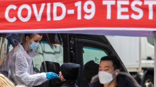 FILE PHOTO: A man is tested for the coronavirus disease (COVID-19) at a mobile COVID-19 testing ...