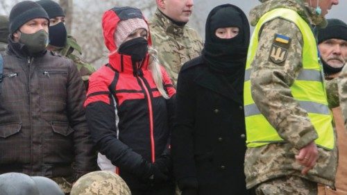 Reservists of the Ukrainian Territorial Defence Forces line up as they take part in military ...