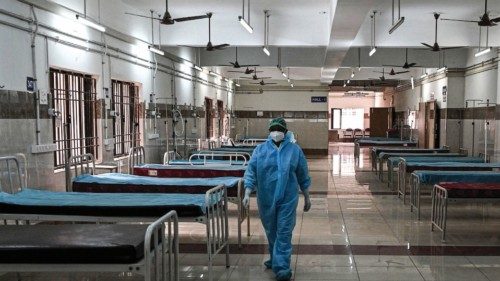 A medical staff walks inside an isolation ward prepared for Covid-19 coronavirus patients at a ...