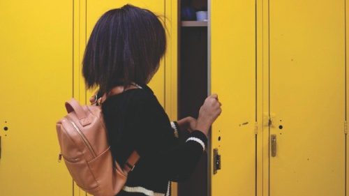 Jolli Phillips places her belongings in her locker before class begins at the Bates Academy on ... Jolli Phillips places her belongings in her locker before class begins at the Bates Academy on ...