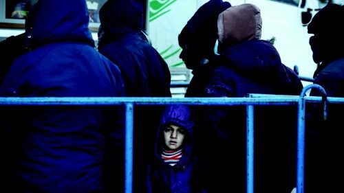 A migrant child looks on at the transport and logistics centre Bruzgi on the Belarusian-Polish ...