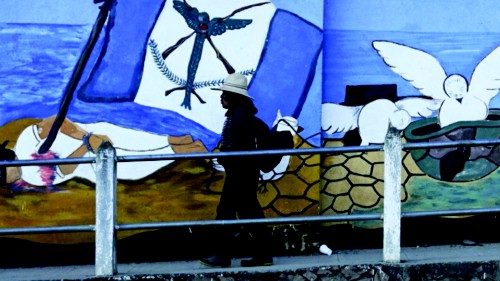 A local resident passes by a mural depicting images of the Guatemalan armed conflict (1960-1996), in ... A local resident passes by a mural depicting images of the Guatemalan armed conflict (1960-1996), in ...