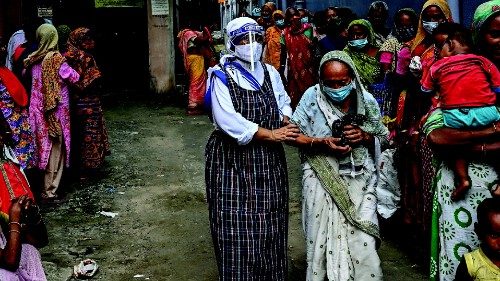 Nuns from Missionaries of Charity distribute food to the needy on the occasion of ?Peace Day? to ...